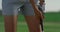 Sportswoman playing golf shot at course grass. Golfing player enjoy fun summer.