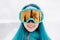 Sportswoman in protective sunglasses in winter.