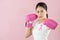 Sporty Asian girl wear boxing gloves anti-cancer