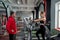 sporty beautiful female trainer and pumped male trainer in sportswear train in gym.