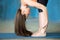 Sporty beautiful young woman Doing Standing forward bend pose