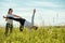 Sporty beautiful young woman practicing yoga, standing in Half Moon exercise, Ardha Chandrasana pose