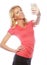 Sporty blond woman making selfie