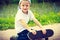 Sporty child kid with his skateboard outdoor.