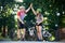 Sporty couple giving high five in park