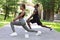 Sporty Lifestyle. Black Fitness Couple Working Out Together In Park, Stretching Muscles