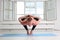 Sporty man practicing yoga. Squat, Garland pose, Malasana