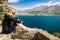 Sporty woman admire the panorama from the Ponale trail in Riva d