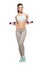 Sporty woman do her workout with dumbbells