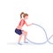 Sporty woman doing crossfit exercises with battle rope girl training in gym cardio workout healthy lifestyle concept