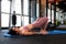 Sporty woman doing exercises doing Bridge position on blue mat. Healthy beautiful women doing glute Bridge exercise  pelvic lift a