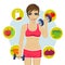 Sporty woman with dumbbells and variety of healthy fruits