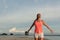 Sporty woman enjoying relax and freedom at the beach