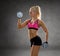 Sporty woman with heavy steel dumbbells