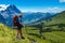 Sporty woman hiking in Switzerland alps