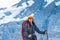 Sporty woman hiking in Switzerland alps