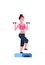 Sporty woman holding dumbbells doing squats on step platform girl training in gym aerobic workout healthy lifestyle