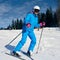 Sporty woman skiing