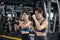 Sporty young asian women training boxer wearing strap on wrist with coach, Boxing practice sports