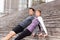 Sporty young couple holding reverse plank position