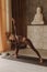 Sporty young woman doing yoga practice on yoga mat is in the yoga room. Vintage tonned. Concept of healthy life and natural