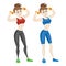 Sporty young woman in sportswear. Fit girl with dumbbells.