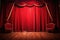 spotlight illuminating center stage with red velvet curtains