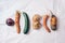 Spotted carrot, eggplant, beetroot. Ugly vegetables on grey background. Ugly food concept. Top view, flat lay