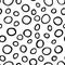 Spotty abstract vector seamless pattern. Random rings, dots, circles, spots, stains, bubbles, stones. Design for fabric, funny