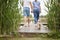 Spouses enjoy an after rain weather on the dock