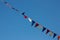 A sprawling garland of triangular colored flags