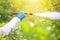 Spray ecological pesticide. Farmer fumigate in protective suit and mask lemon trees. Man spraying toxic pesticides, pesticide,