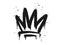 Spray painted graffiti crown sign in black over white. Crown drip symbol