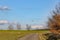 A spray plane applies chemicals to a field. Agricultural aviation