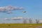 A spray plane applies chemicals to a field. Agricultural aviation