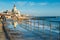 Spray from waves splashing on boardwalk leading to Tamariz beach in the Atlantic resort town of Estoril near Lisbon