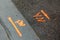 Sprayed asphalt marks sign arrow construction