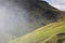 Sprayed water in the valley with horses from the beautiful Skogafoss