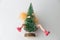 Spread legs doll covered with fir tree winter holidays making love abstract