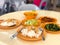 A spread of rice and dishes on a table at coffeeshop. Economy mixed rice with vegetables and meat is popular in Singapore and