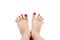 Spread your toes. with painted nails in red. on an isolated background
