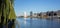 Spree river east side at Berlin, Germany. Industrial area, tv tower and Oberbaum bridge. Panoramic view, banner