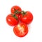Sprig of ripe tomato  on white background. A half of a tomato. Close up. Juicy ripe vegetables.