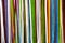 Sprigs colorful buckets. Background vertical stripes.