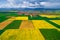 Spring aerial view over the agricultural rapeseed fields