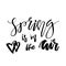 Spring is in the Air - Hand drawn inspiration quote. Vector typo