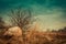 spring, autumn rural landscape. Boulders and dry grass around a small bare tree in the field