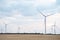 Spring or autumnal landscape with windmills on fields. Polish countryside with windmills.