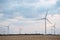 Spring or autumnal landscape with windmills on fields. Polish countryside with windmills.