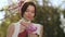 Spring Beauty Portrait of a Woman with Flower Outdoors